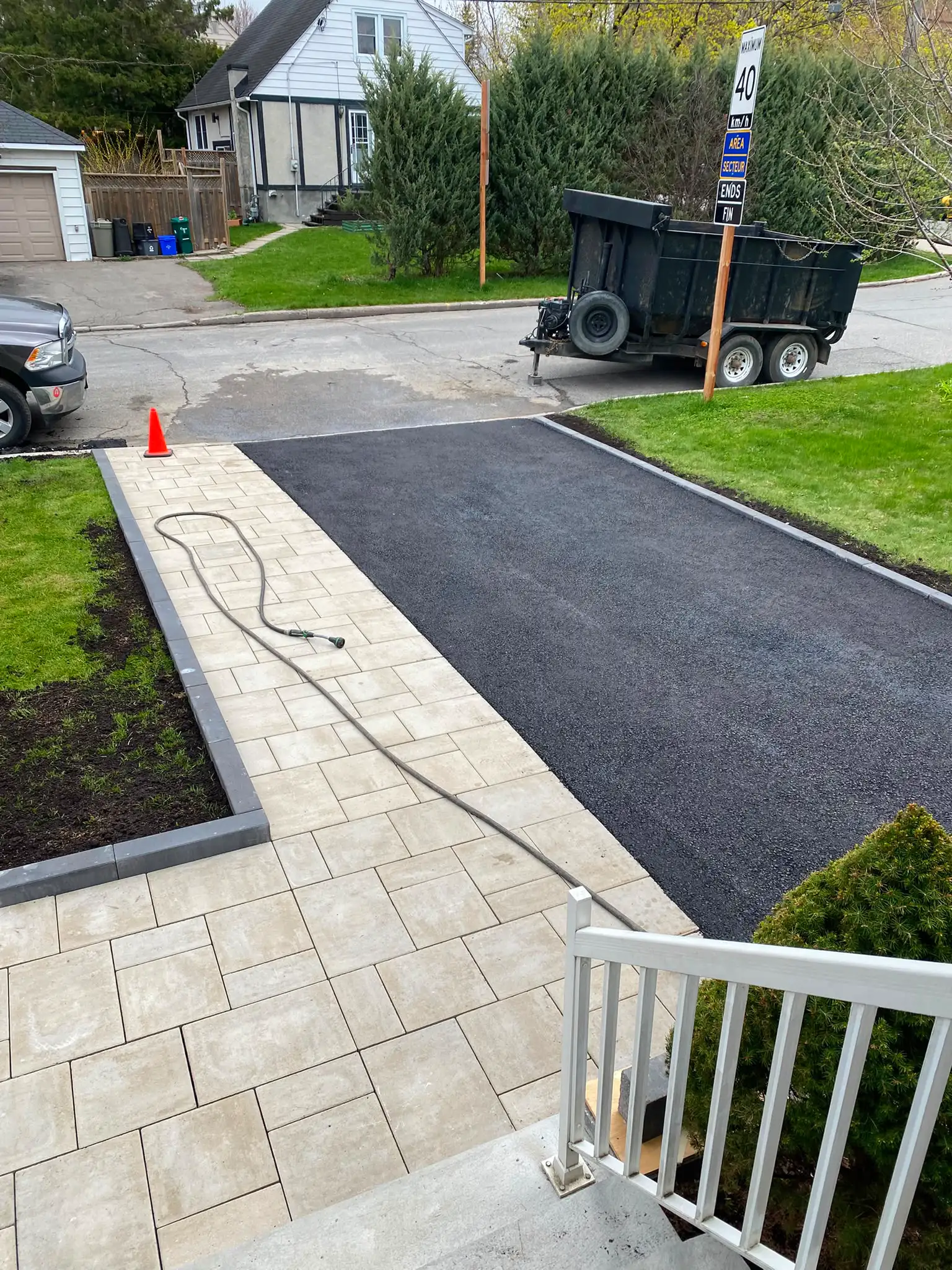 Asphalt driveway paving installation 7