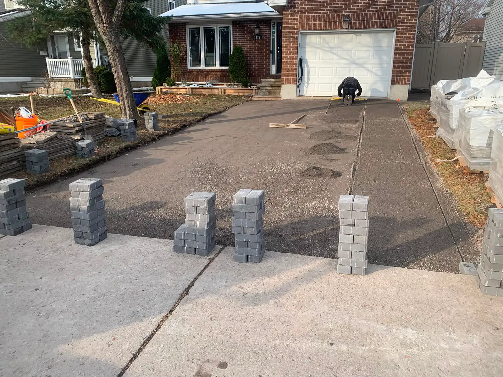 Interlock driveway paving installation 10