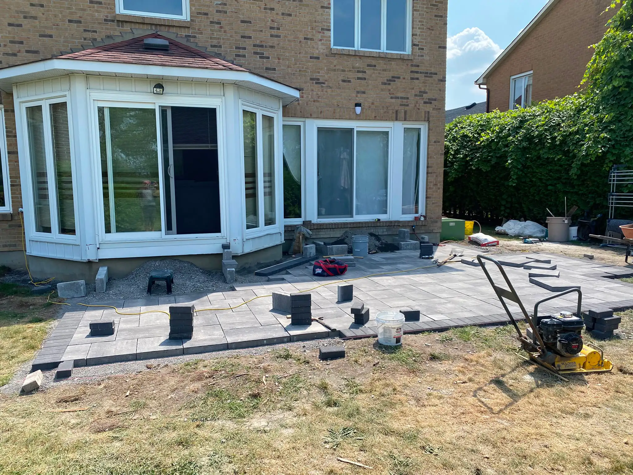 Interlock driveway paving installation 7