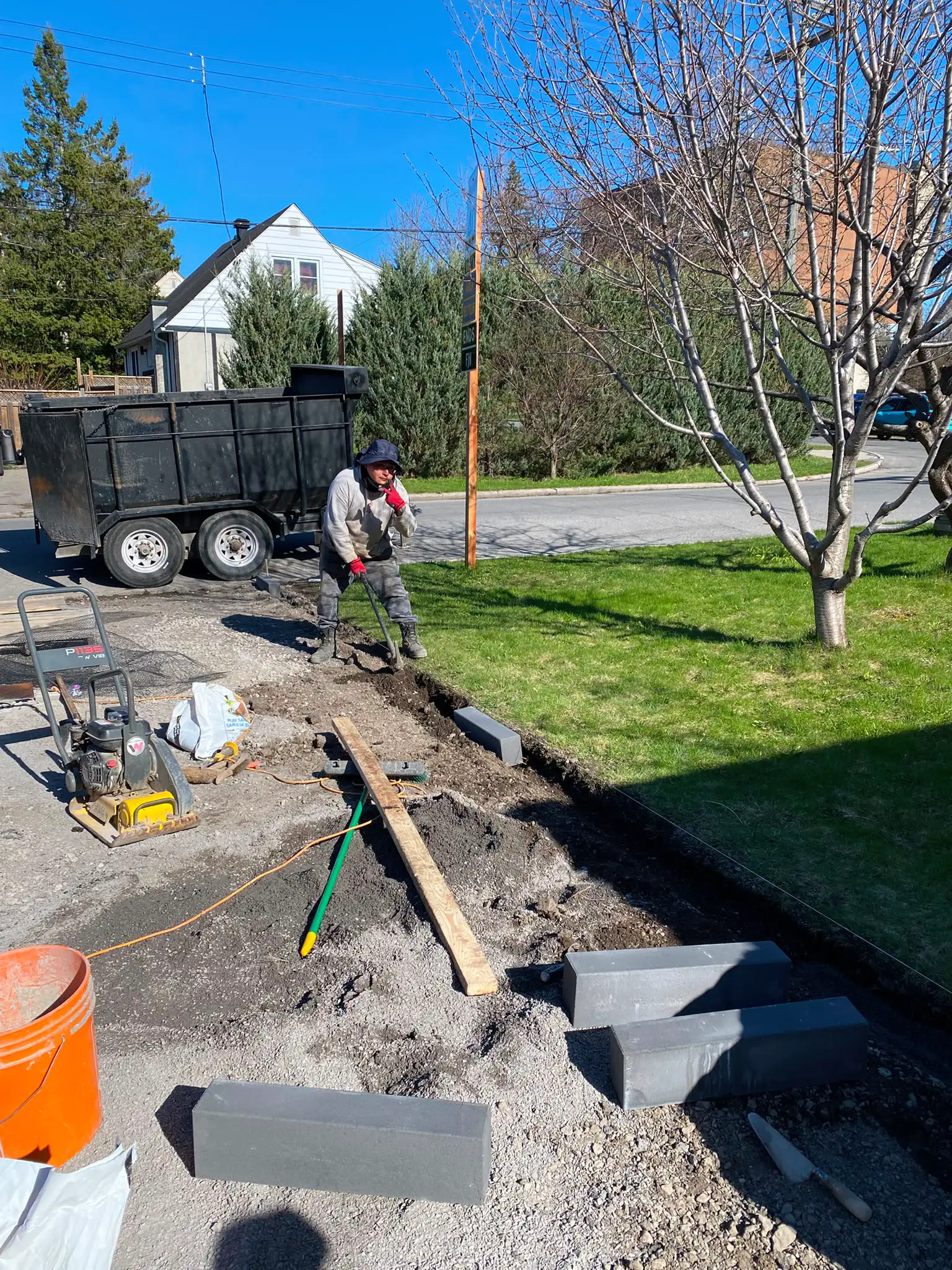 Interlock driveway paving installation 9